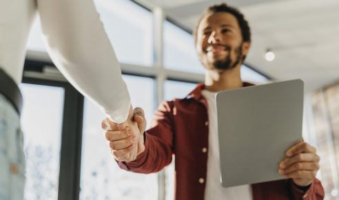 close-up-business-people-hand-shake